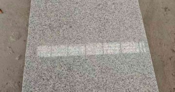 日喀则布芝麻白光面毛板