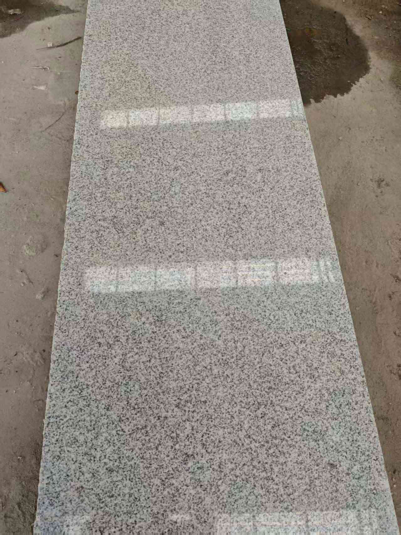 日喀则布芝麻白光面毛板